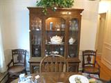 Nice quaint dining room set. Small, 4 chairs, oval table with 3 leaves, and of course a nice china that matches (china priced on its own)