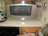 Brand new GE Microwave from Home Depot - still has blue film over the stainless outside!!!
