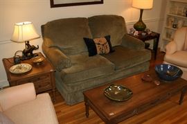 Comfy neat loveseat, Elephant lamp with schoolboy rider, Retro End & Coffee tables, Hand made Pottery, tall Green lamp, early 80s pink chairs