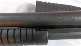 Winchester Model 1300 Defender 12 Gauge Shotgun with Both Stock and Tactical Pistol Grip, Chambered for 2 3/4" and 3" Shells.
