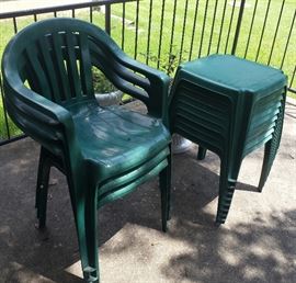 green outside chairs with stools
