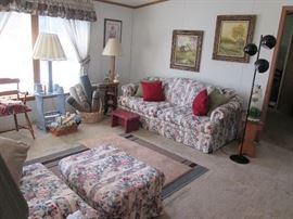 Like new floral upholstered sofa, chair and ottoman