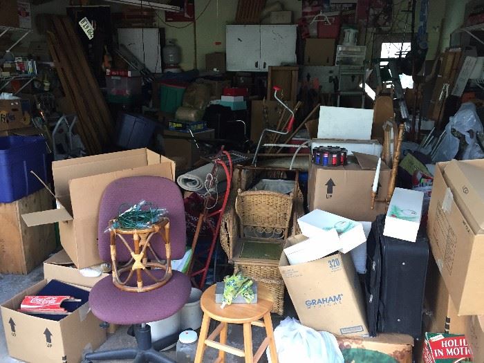 garage overfilled with antiques and collectibles