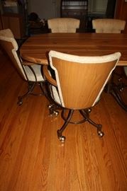 Note the back of chairs is wood