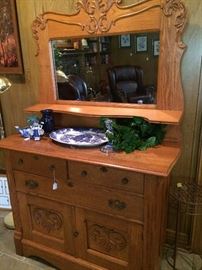 Antique mirrored cupboard; blue & white items including turkey platter