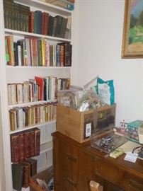 More books and lots of children's books on the other wall.