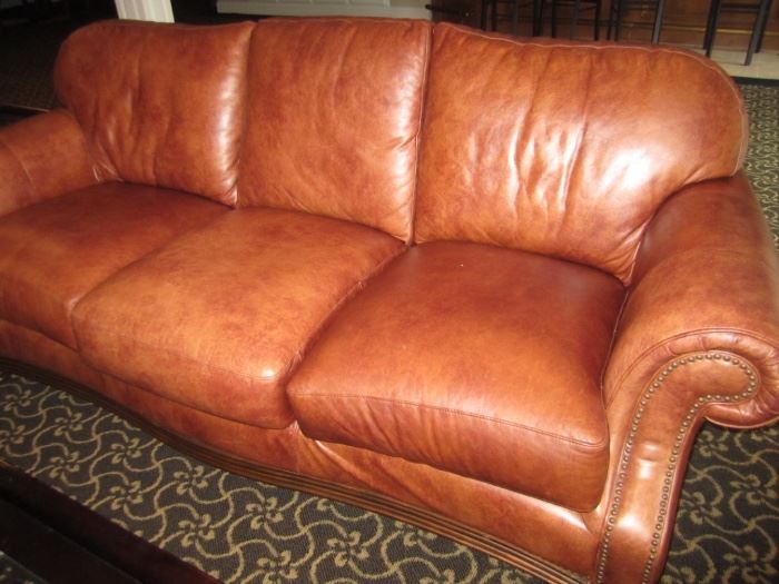 LEATHER SOFA AND MATCHING CHAIR AND OTTOMAN