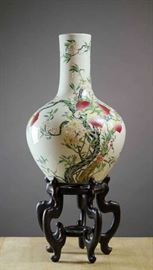 Chinese porcelain vase with wood stand