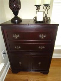 Bar-top opens lifting tray of decanters, shaker, ice bucket, and glassware