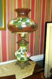 This beautiful lamp is just one of many elegant pieces located throughout this house for sale.  These are hard to find in this condition with this kind of detail. Don't let it slip you by.