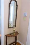 Foyer table and mirror.  Perfect for throwing keys and mail on and last minute hair check before leaving the house.