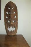 Tribal masks and other unique items for sale.