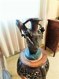 Bronze vase with colored floral accents