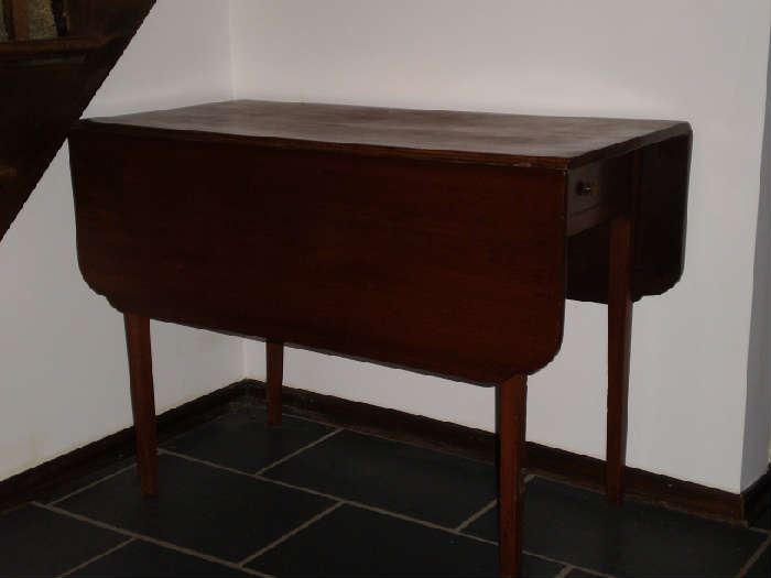 A nice double drop leaf table with drawer