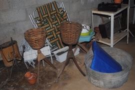 Lots of terracotta pots, planters both wood and metal, galvanized tub and metal kitchen cart