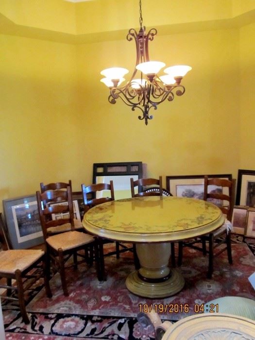 Fabulous pedestal table by Woodland Furniture of Idaho Falls of Idaho  (was $4000 new!) Comes with or without 6 wicker chairs, a large oriental carpet and the wrought iron chandelier seen hanging above all sold as a group or individually.