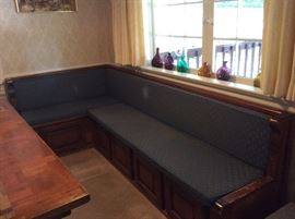 Breakfast nook bench seating with storage underneath, not sure if this was a reclaim from years ago, very cozy and interesting.