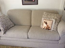 Loveseat neutral color with pull out bed, barely used