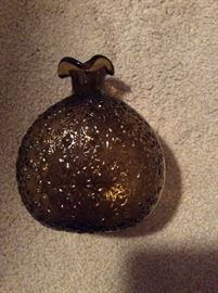 interesting shaped and embossed amber bottle