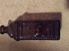 Apple bitters bottle deep purple color