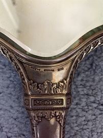 sterling stamp on the hand mirror part of travelers kit