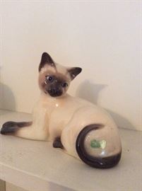One of many Siamese cat figurines
