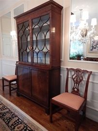 MAHOGANY BOOKCASE, UPPER SECTION HAVING GLAZED DOORS WITH SHELVES, LOWER SECTION HAVING CUPBOARD DOORS. CASE HAS EXCELLENT COLOR AND PATINATION. ENGLAND 1780-1800.