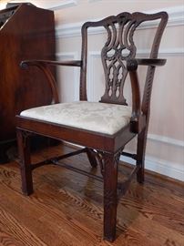 CHIPPENDALE MAHOGANY ARMCHAIR WITH DROP IN SEAT. WELL CARVED WITH GOOD COLOR AND PATINA. ENGLAND CIRCA 1820.