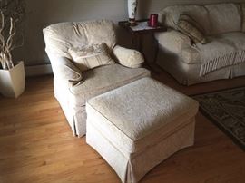 Nice clean, cream colored and comfortable occasioanl chair and matching couch Thomasville