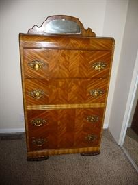 this is a beautiful 30's waterfall chest of drawers