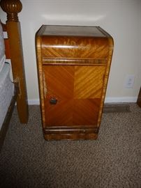 there is 2  beautiful 30's waterfall lamp side chests
