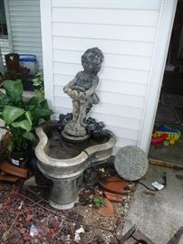 Water fountain and more decor in the yard 