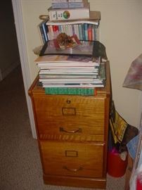 Beautiful oak 2 drawer file cabinet with sewing books and supplies