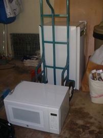 Near new microwave and small refrigerator