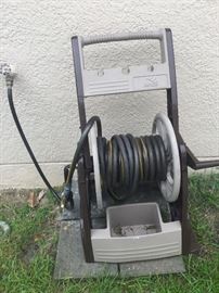 One of two garden hose reels 