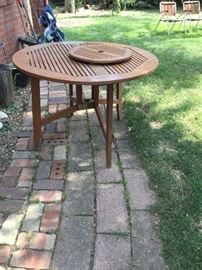 Outdoor table with umbrella stand