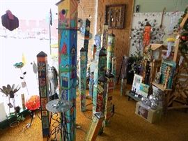 Loads of Post Art pieces including bird feeders and bird baths.