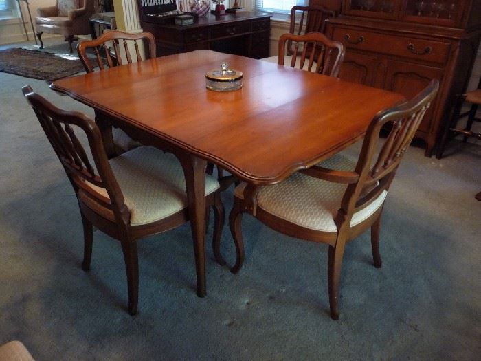 Wood Table with 4 Leafs and 6 Chairs