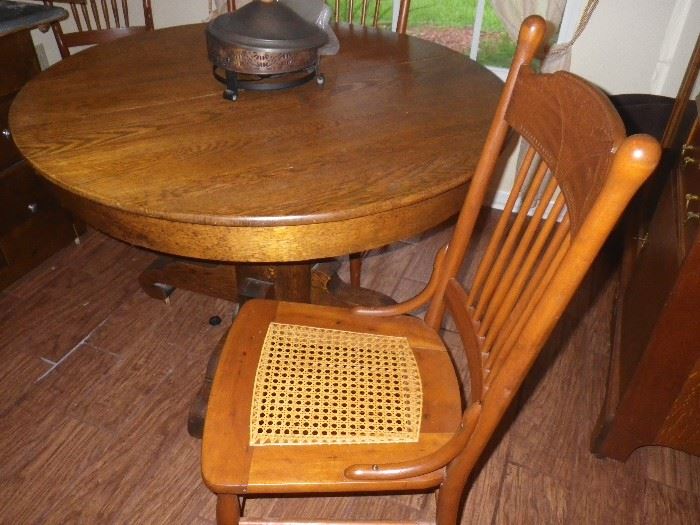 Oak table and one of 4 chairs
