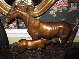 Bronze cast sculpture on oval base. Signed. 11.50" high x 13.00" wide. Dated: 1868