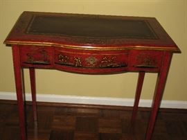 Leather insert top serpentine front console table with mahogany/pine secondary woods and decorated in the Verni Martin style, bow-front, Chinoiserie pattern. Circa: 1870. 29.5" high x 30" wide, 17.25" deep.