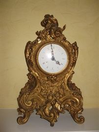 Rococo eight-day movement clock. Origin: Germany. 21" high x 14" wide