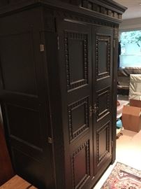 Storage armoire with shelves