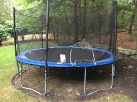 Trampoline- great condition with safety net- come prepared to disassemble- 