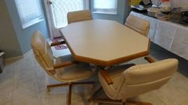 Kitchen table and 4 canister chairs with 1 leaf