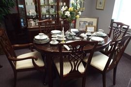 cherry dining room table for 499.00 and matching hutch 299.00