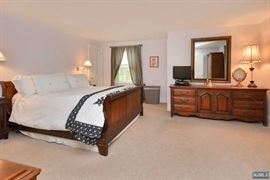 Queen size sleigh bed and French triple dresser