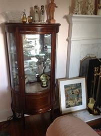 Antique French curve glass curio cabinet