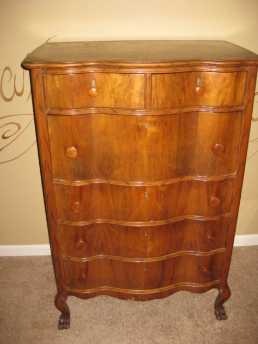 Gorgeous condition curved and burled wood chest of drawers.