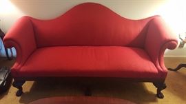 Gorgeous red camelback sofa with claw feet